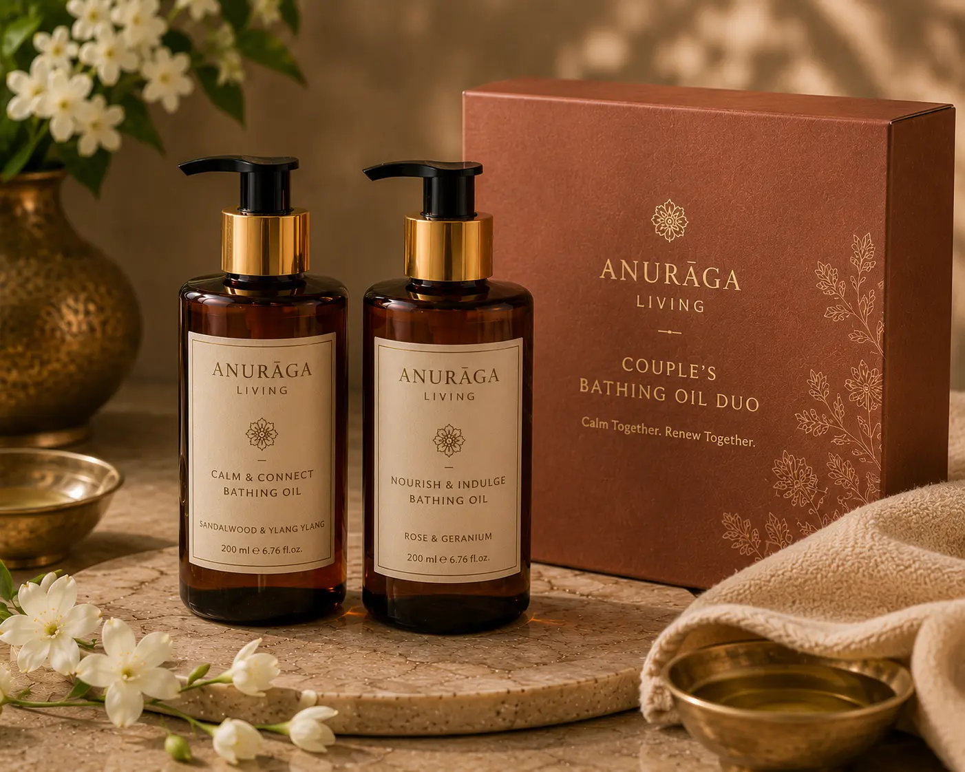 Two matching bottles of massage oil tied with twine